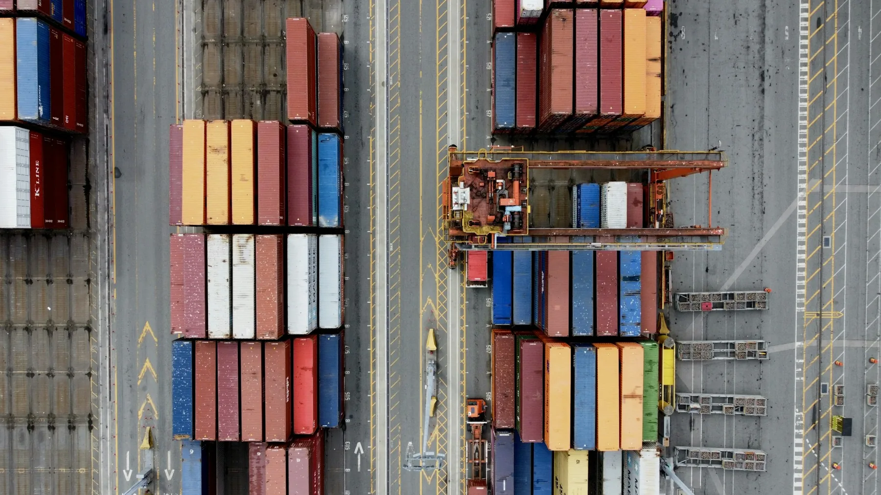 Shipping containers and cranes at a commercial port