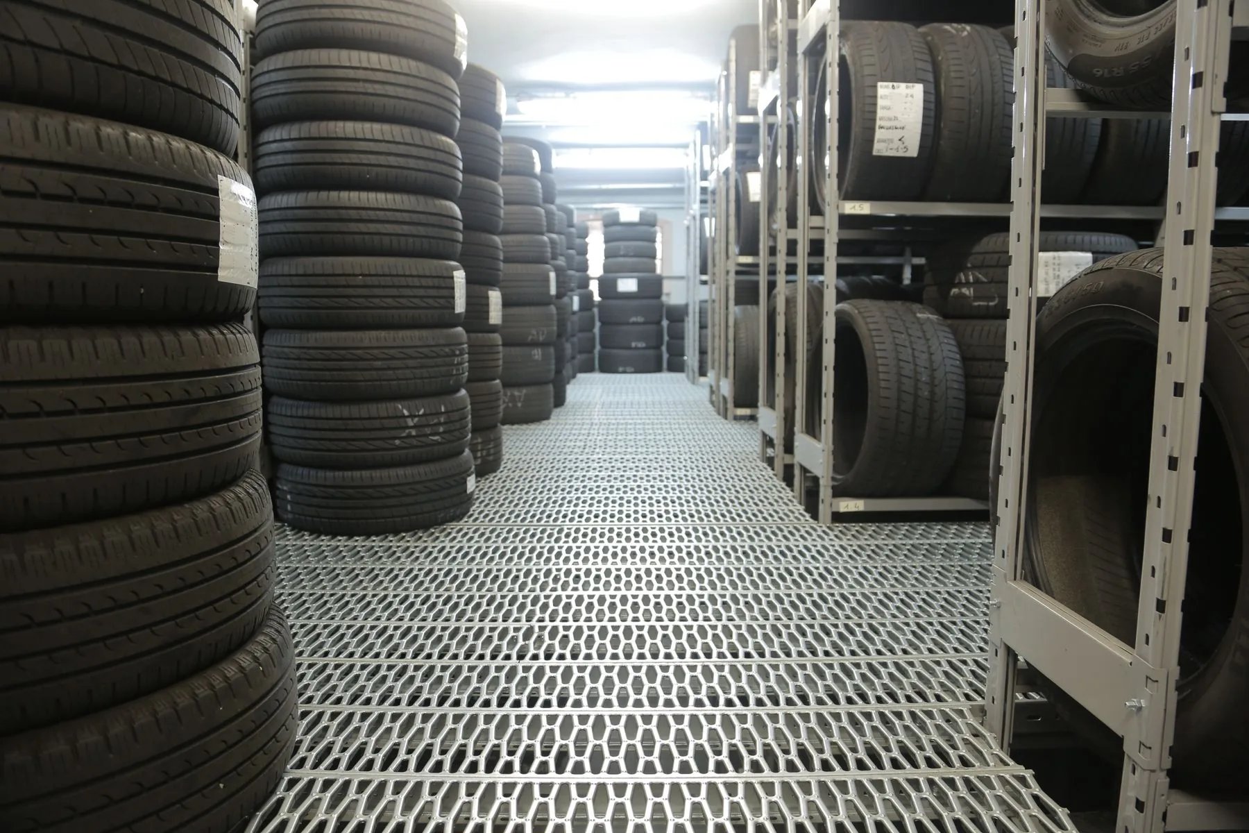 Rows of tyres in a storage facility